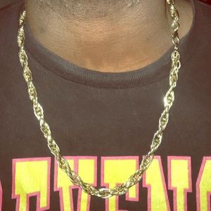 Thick chain gold in color